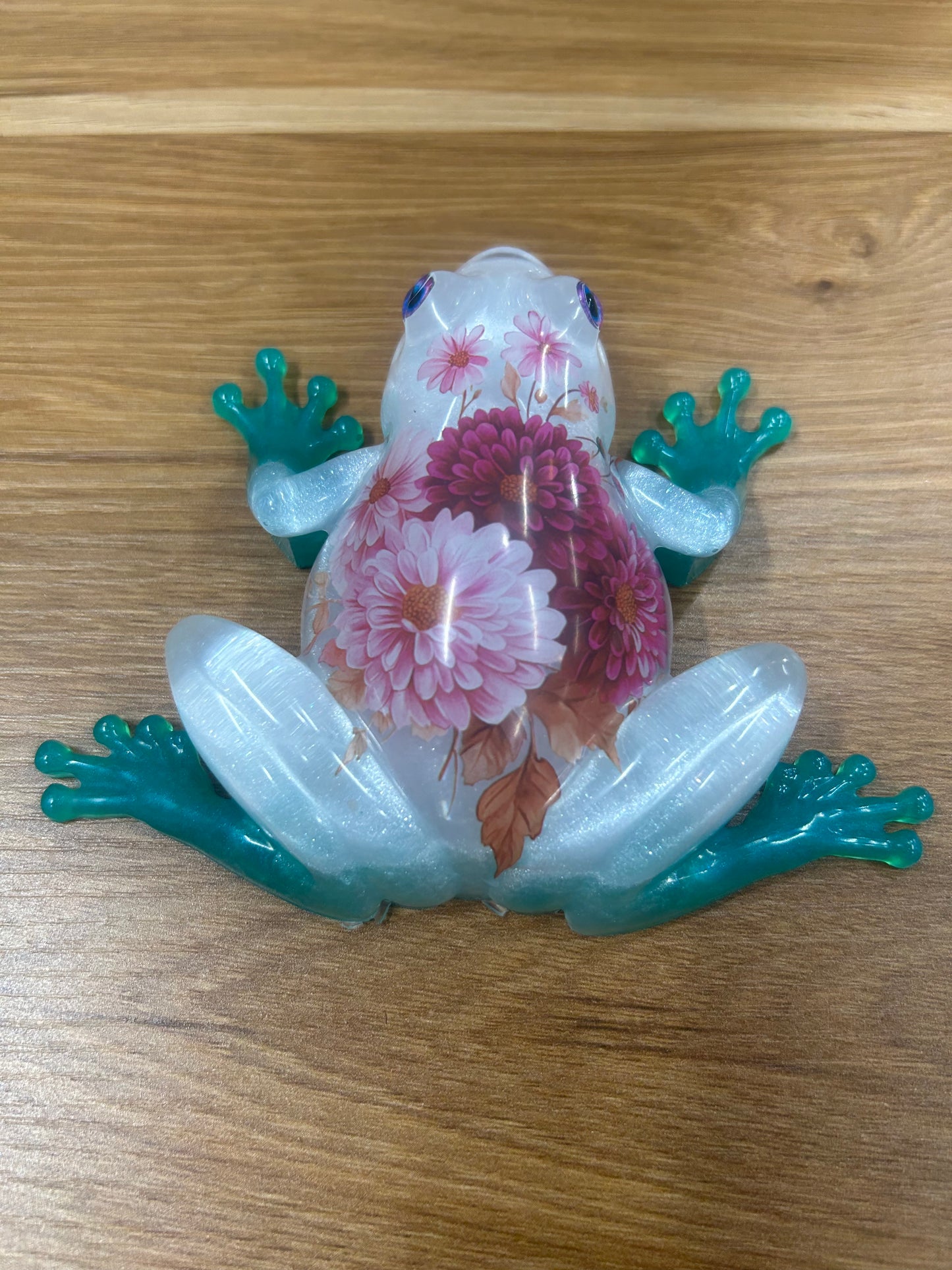 Pink flowers teal feet Frog