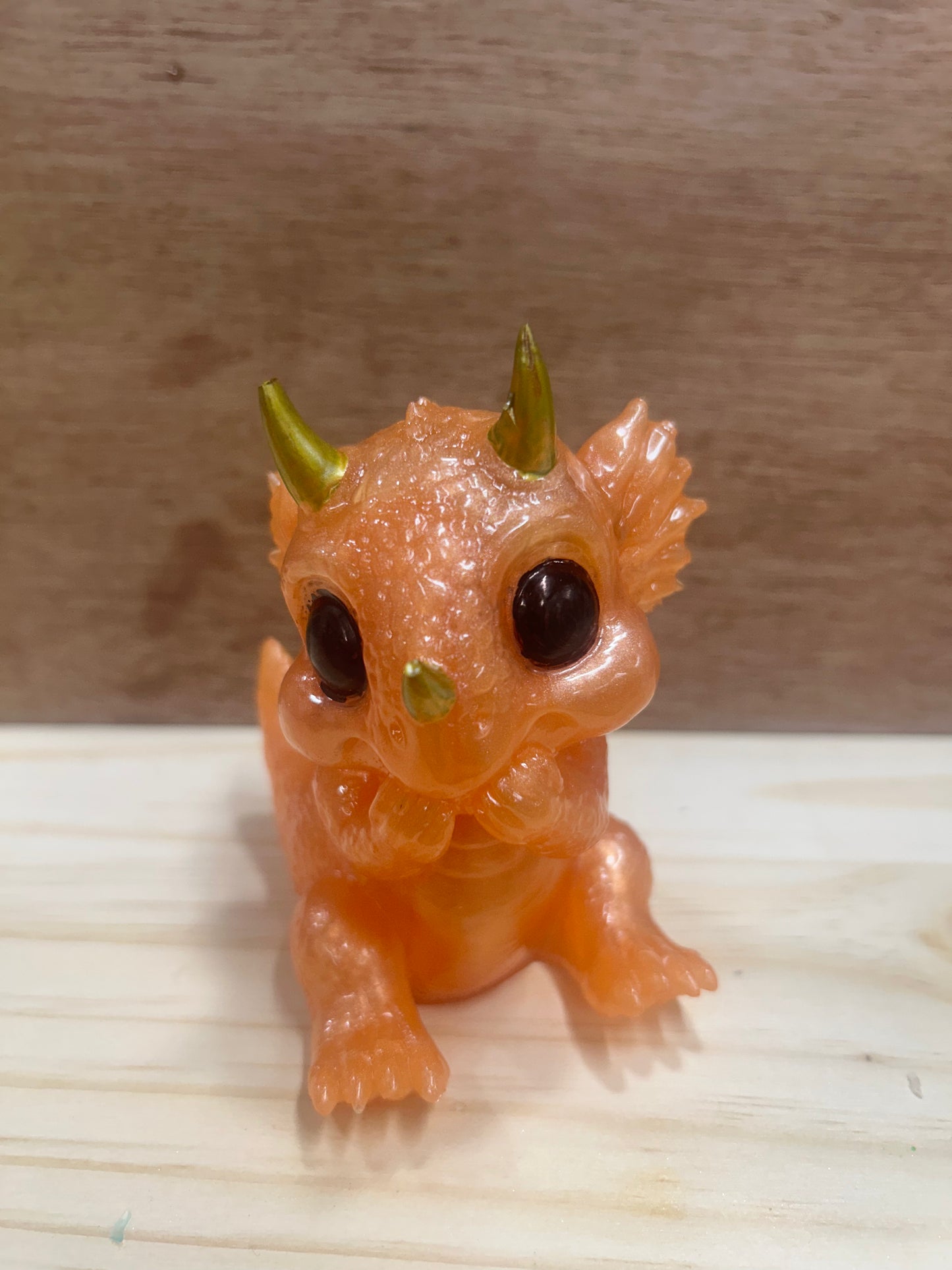 #127 Baby Dino orange